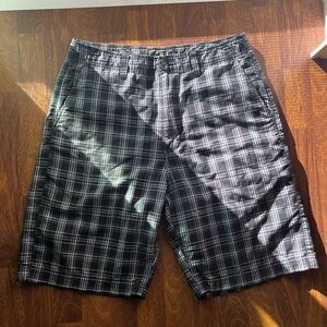 Men’s black and white pattern shorts.